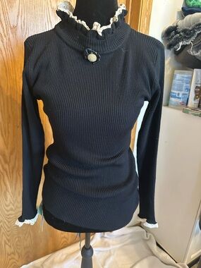 Classic Black Ribbed Mock Neck Sweater with Lace Trim